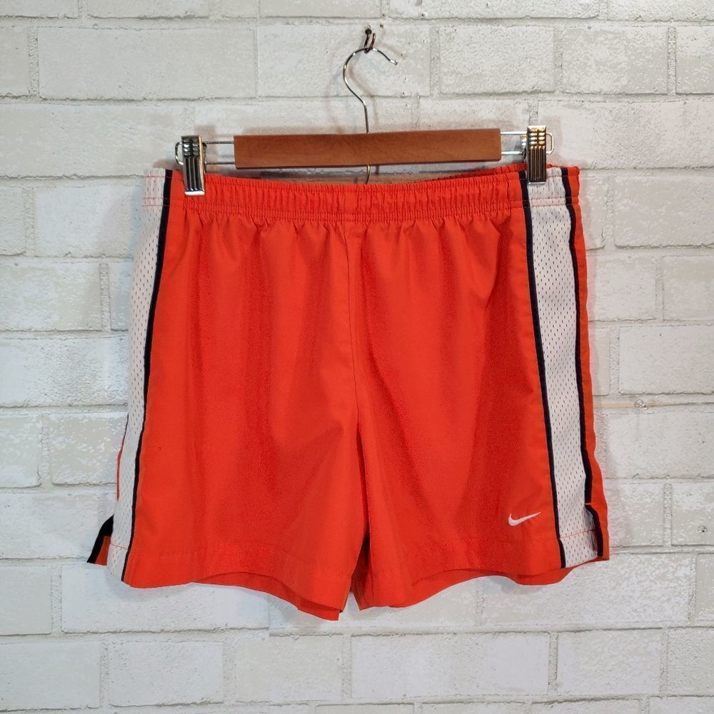 NIKE orange athletic shorts